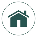 Green house icon in circle for home building materials and flooring solutions