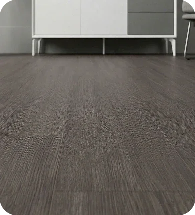 Dark gray wood-grain luxury vinyl plank flooring in modern interior